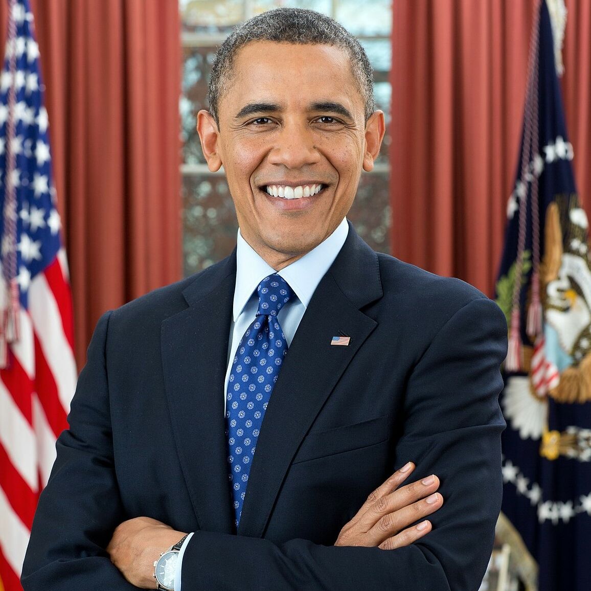 President Barack Obama is photographed during a presidential portrait sitting for an official photo in the Oval Office, Dec. 6, 2012.  (Official White House Photo by Pete Souza)