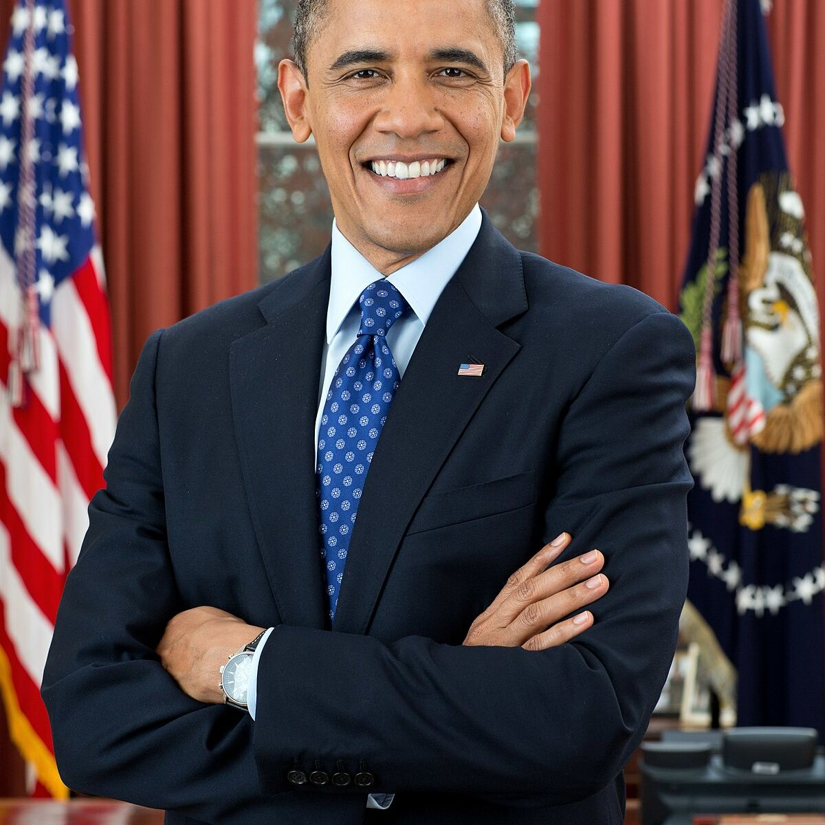 President Barack Obama is photographed during a presidential portrait sitting for an official photo in the Oval Office, Dec. 6, 2012.  (Official White House Photo by Pete Souza)